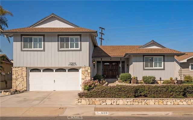 view of front of property featuring a garage