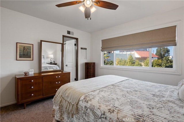 carpeted bedroom featuring ceiling fan