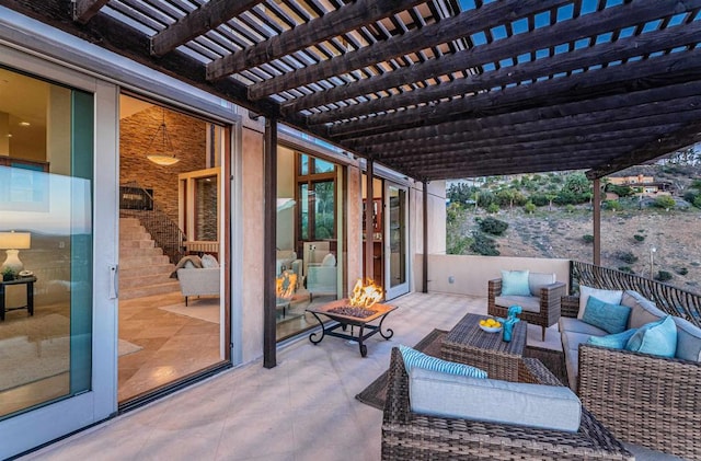 view of patio / terrace featuring an outdoor hangout area and a pergola