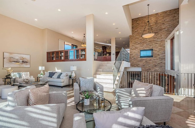 living room featuring a high ceiling