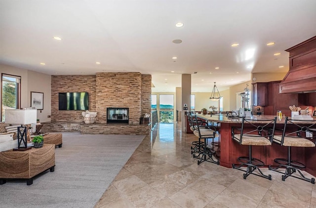 living room featuring a fireplace