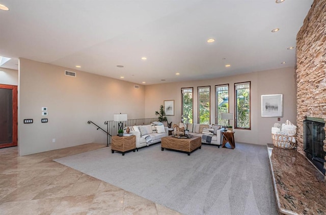 living room with a fireplace