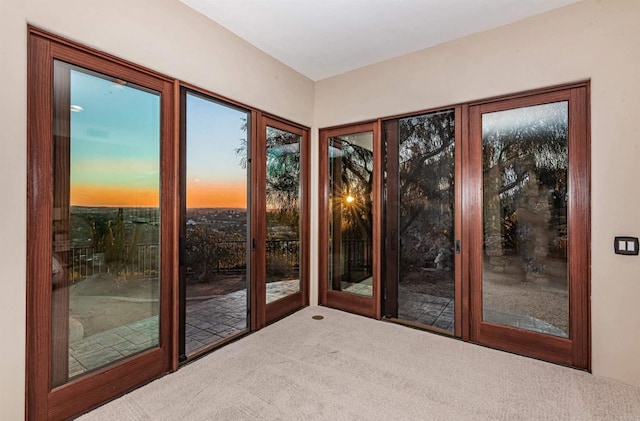 entryway with carpet floors