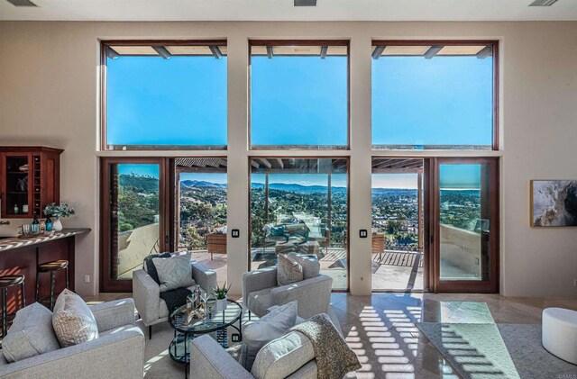 2362 Edgehill Rd, Vista, CA 92084 - living room with a wealth of natural light, visible vents, and a mountain view