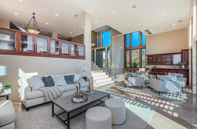2362 Edgehill Rd, Vista, CA 92084 - living room with a high ceiling, recessed lighting, stairs, and visible vents