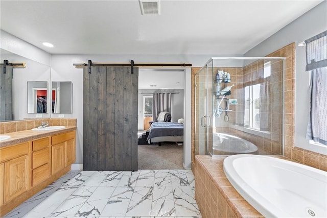 full bathroom featuring visible vents, ensuite bath, a garden tub, marble finish floor, and a shower stall