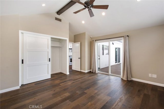 unfurnished bedroom with ceiling fan, access to exterior, dark hardwood / wood-style flooring, a closet, and beamed ceiling