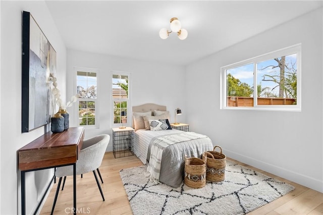 bedroom featuring light wood-type flooring