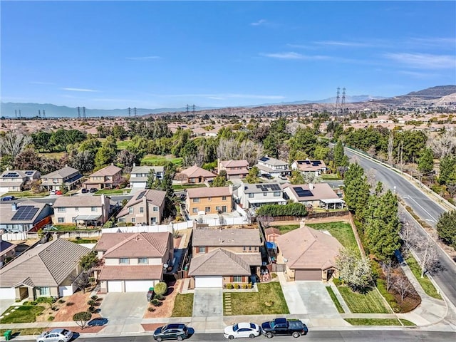 birds eye view of property featuring a mountain view