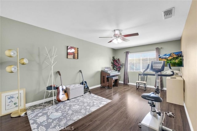 interior space featuring dark hardwood / wood-style flooring and ceiling fan