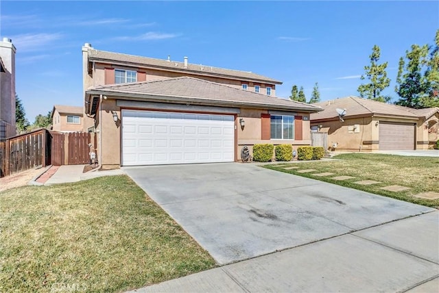 front of property featuring a garage and a front yard