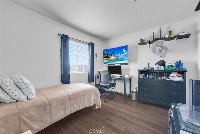 bedroom featuring dark wood-type flooring