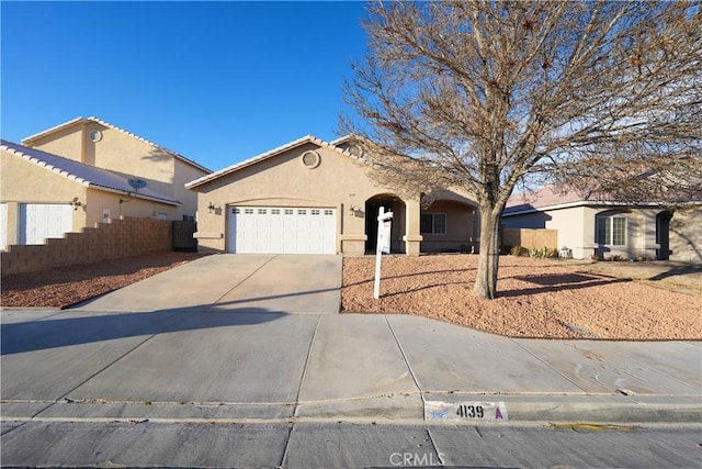 view of front of property featuring a garage