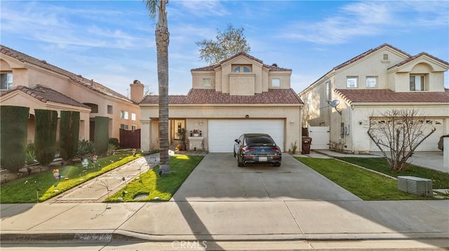 view of front facade featuring driveway, a tiled roof, a front lawn, and stucco siding