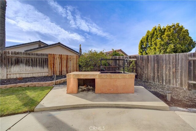 view of patio featuring a fenced backyard