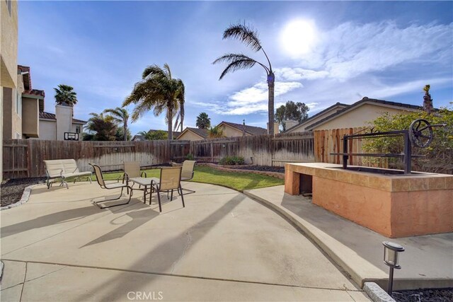 view of patio featuring a fenced backyard