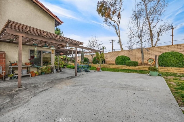 view of patio featuring a pergola