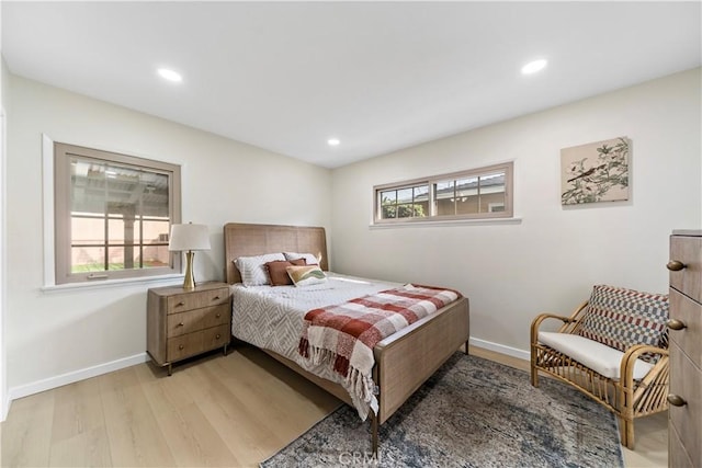 bedroom featuring light hardwood / wood-style flooring