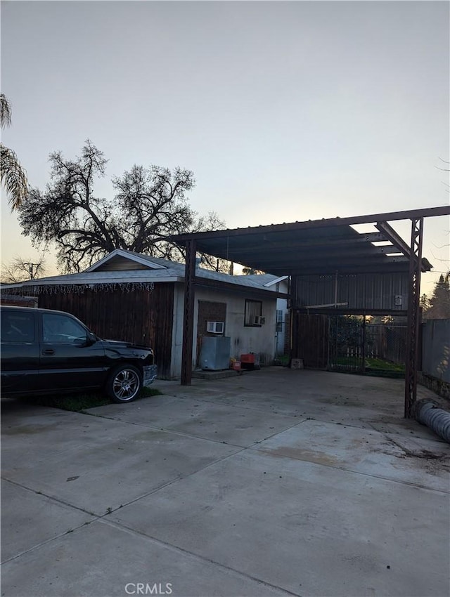 exterior space featuring a carport