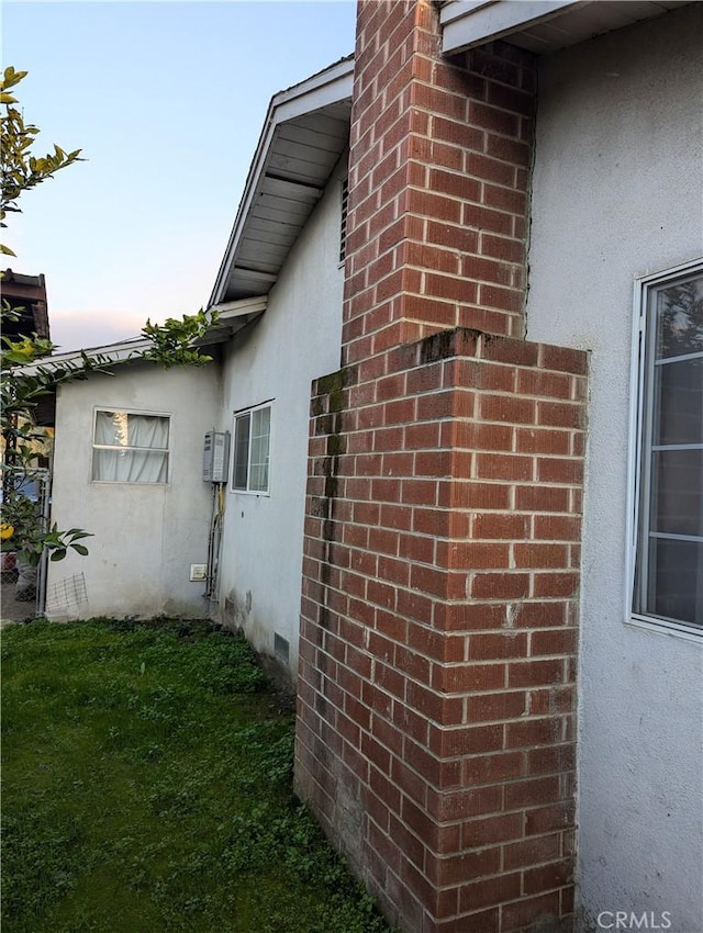 view of property exterior at dusk