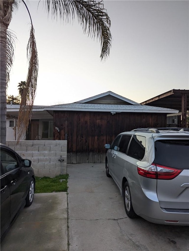 view of property exterior at dusk