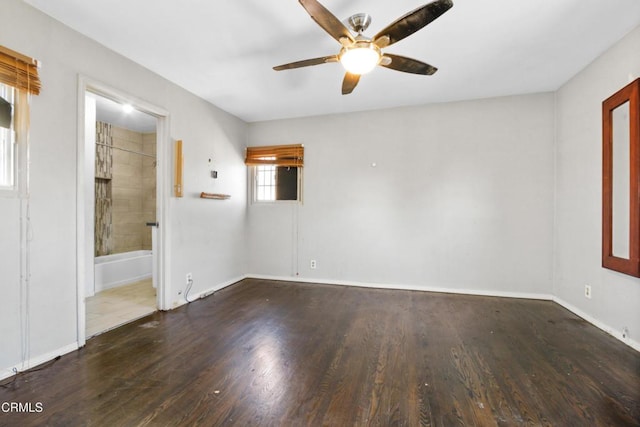 spare room featuring ceiling fan and wood-type flooring