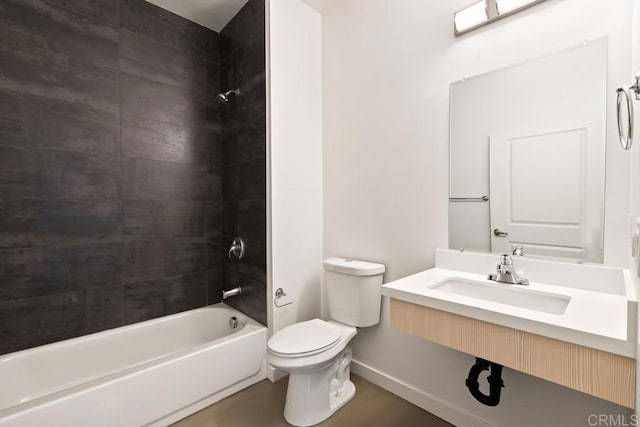 full bathroom featuring sink, toilet, and tiled shower / bath