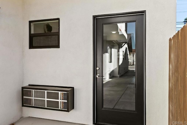 doorway to property with heating unit