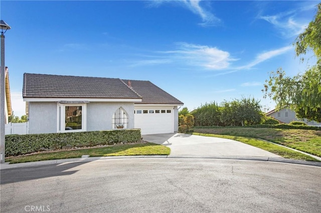 ranch-style home with a garage