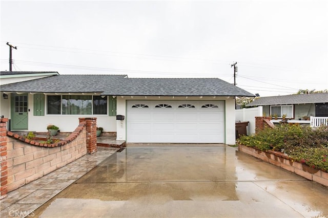 single story home with a garage