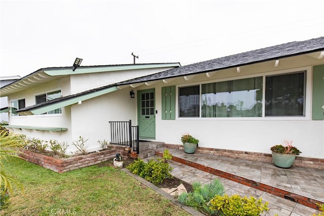 view of front of home with stucco siding