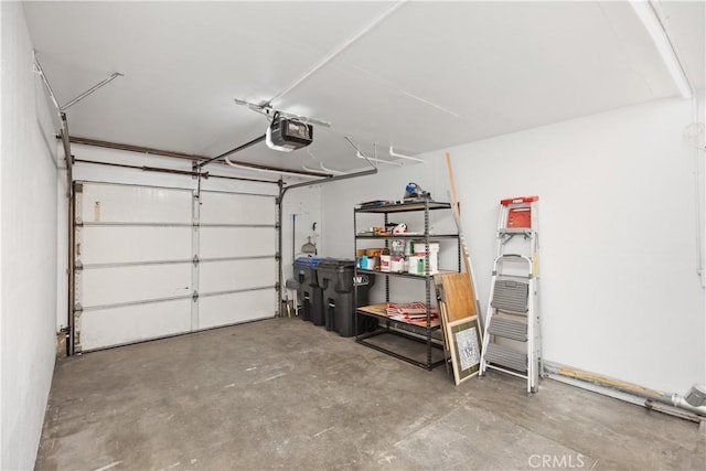 garage featuring a garage door opener