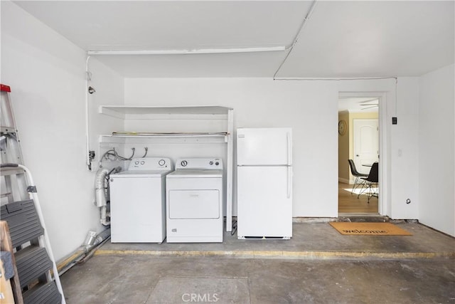 laundry room with laundry area and washing machine and dryer