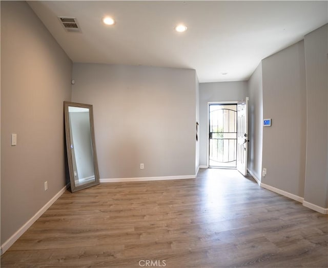 foyer with light hardwood / wood-style flooring