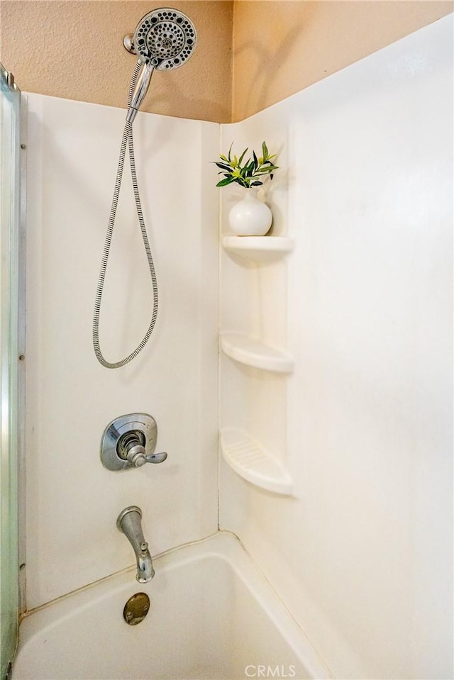 bathroom featuring tub / shower combination