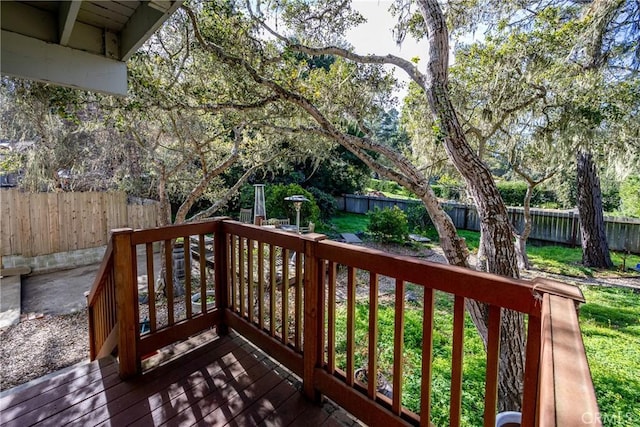 wooden terrace with a yard