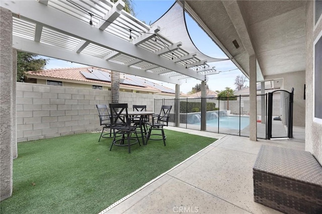 view of patio / terrace with a fenced in pool, a pergola, and pool water feature