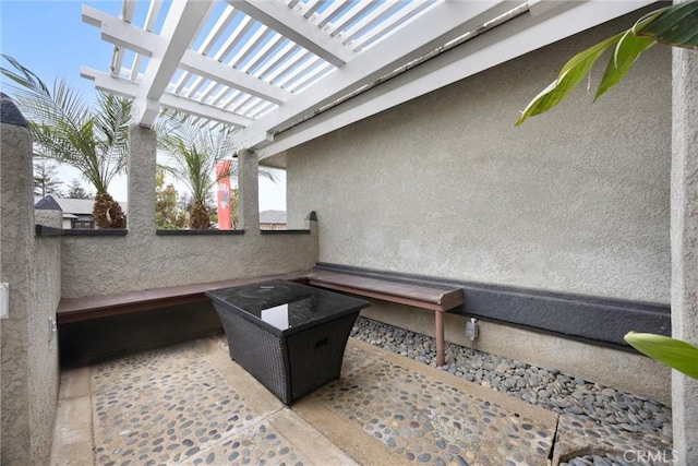 view of patio featuring a pergola