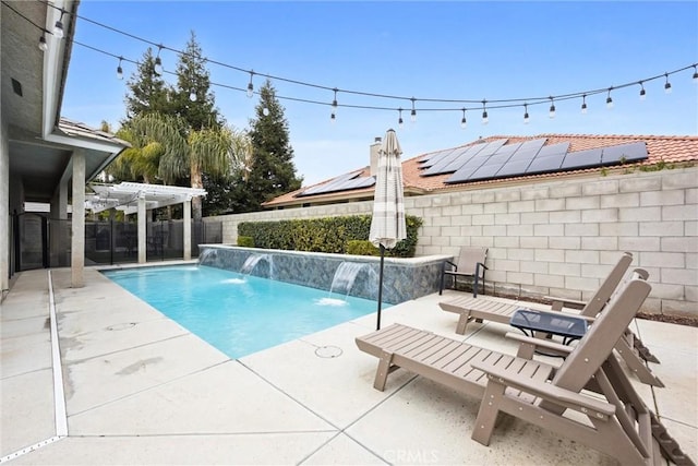 view of swimming pool featuring a patio and a pergola