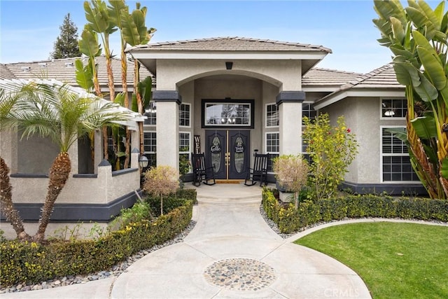 doorway to property with french doors