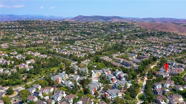 drone / aerial view featuring a mountain view