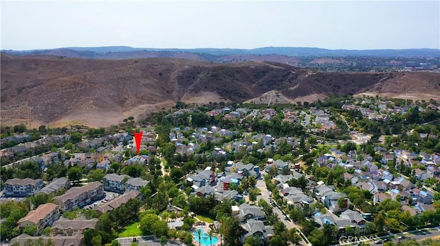 drone / aerial view featuring a mountain view