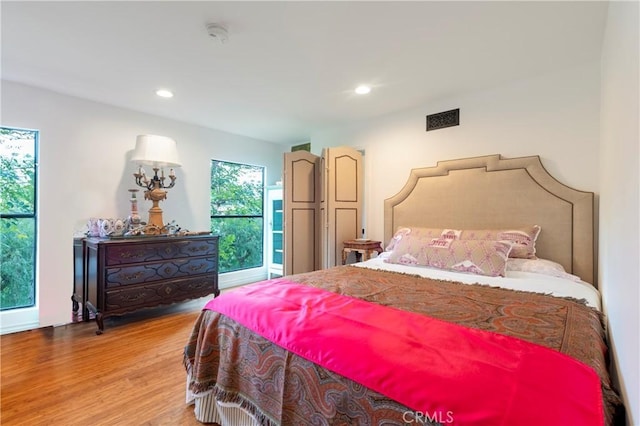 bedroom featuring hardwood / wood-style flooring