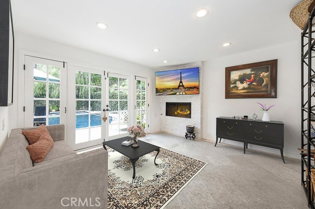 living room with plenty of natural light and french doors