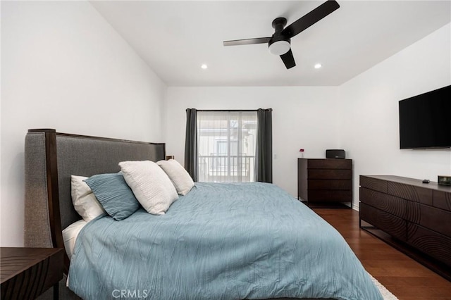 bedroom featuring ceiling fan and dark hardwood / wood-style flooring