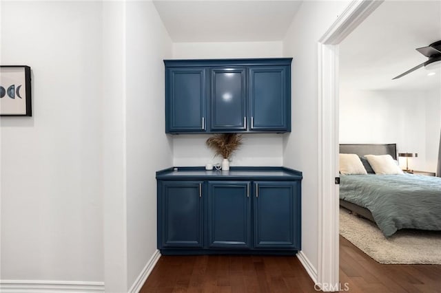 bedroom featuring dark wood-type flooring