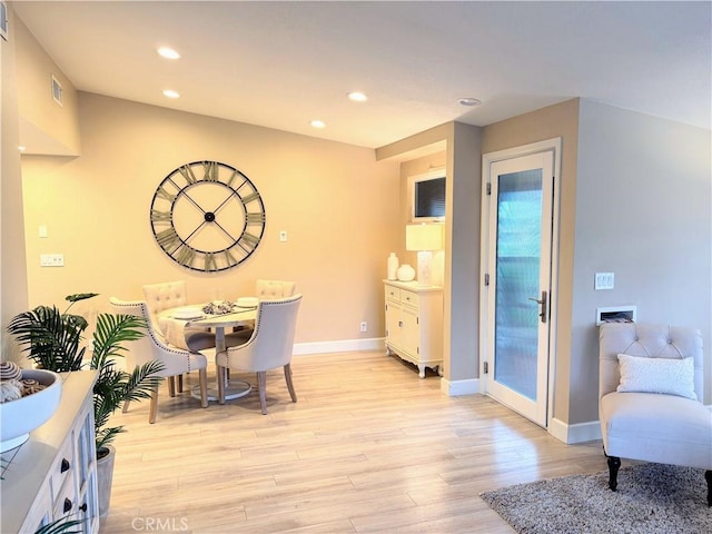 dining room featuring light hardwood / wood-style floors