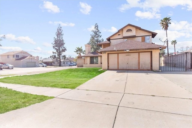 view of property featuring a garage and a front yard