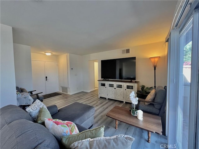 living room featuring light wood-type flooring