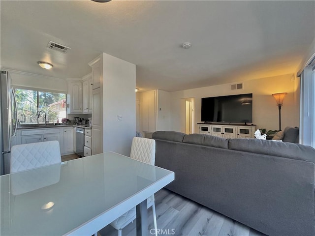 living room featuring light hardwood / wood-style floors